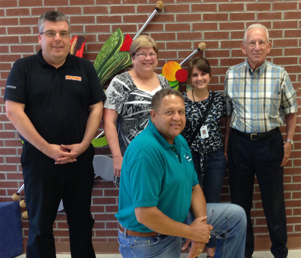 Mike with the the staff of the Lacey A Collier Sensory Complex